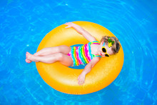 Little Girl In A Swimming Pool