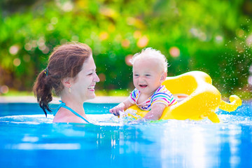 Wall Mural - Mother and baby in swiming pool