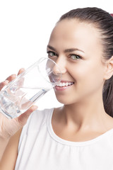 portrait of happy smiling caucasian brunette woman drinking clea