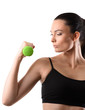 © chettythomas - Fitness woman working out with green dumbbell