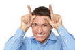 © petrdlouhy - Young man with horns on his head from his fingers
