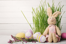 Soft Toy In The Shape Of A Rabbit With Colorful Easter Eggs And