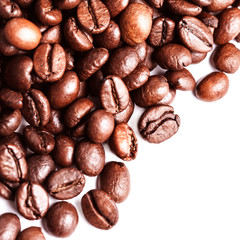 Wall Mural - Brown coffee beans  Isolated On White Background. Roasted coffee