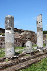 Wall Mural - Columns of an ancient roman temple in Ostia Antica. Rome, Italy