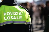Fototapeta  - Italian policeman with police uniform patrol the city