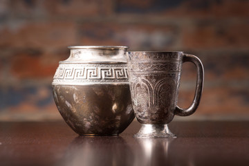 coffee cup and pot with arabic decoration with metal cup   on wo