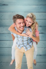 Poster - Handsome man giving piggy back to his girlfriend