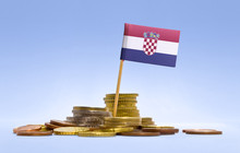 Flag Of Croatia In A Stack Of Coins.(series)