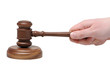 Hand with gavel on a white background