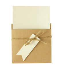 Brown envelope of recycle paper with a blank greeting card isola