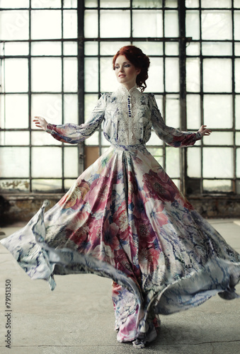 Nowoczesny obraz na płótnie elegance woman with flying dress in palace room