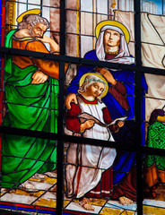 Fototapete - Stained glass window of the Child Jesus and Mary and Joseph
