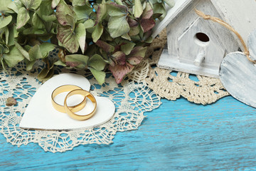 Sticker - pair of wedding rings on old style background