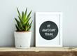 white frame  BE AWESOME TODAY with succulent in diy concrete pot