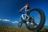 Fototapeta  - Biker-girl in Himalaya mountains, Anapurna region