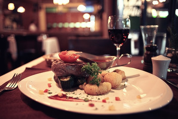 Canvas Print - glass of wine restaurant interior serving dinner