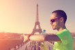 Jogging in Paris with defocused Eiffel tower.