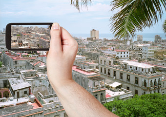 Wall Mural - tourist taking photo of old Havana city