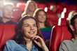 © Syda Productions - happy friends watching movie in theater
