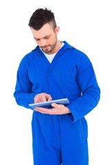Poster - Mechanic pointing on digital tablet