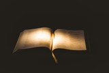 Fototapeta  - Light shining on open bible
