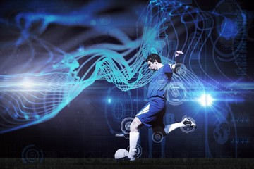 Wall Mural - Composite image of football player kicking ball