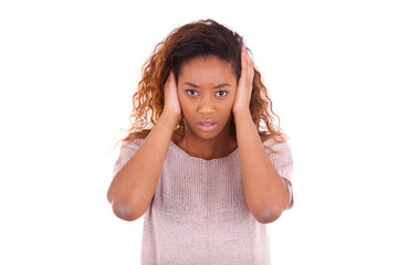 Wall Mural - young african american covering her ears with her hands isolated