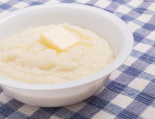Pat Of Butter On Bowl Of Grits Closeup