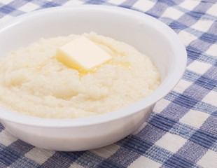 Wall Mural - Pat of Butter on Bowl of Grits Closeup