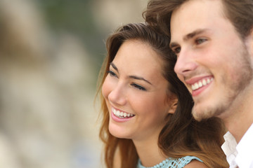 Wall Mural - Happy couple in love looking away together