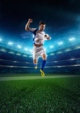 Fototapeta Sport - Soccer player in action