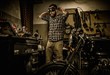 © Nejron Photo - Mechanic preparing ford lathe works in motorcycle customs garage
