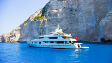 Luxury White Yacht Navigates Into Beautiful Blue Water Near Zaky