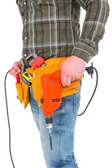 Poster - Smiling manual worker holding drill machine