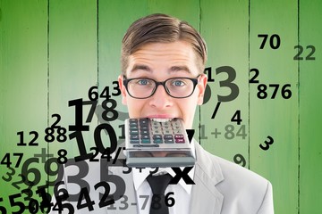Poster - Composite image of geeky smiling businessman biting calculator