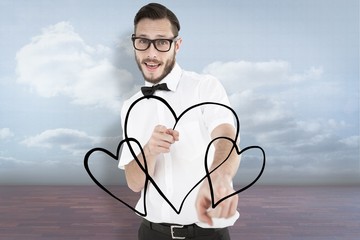 Poster - Composite image of geeky hipster pointing at camera