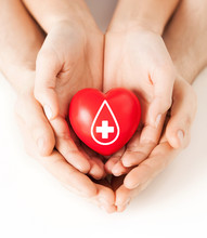 Hands Holding Red Heart With Donor Sign