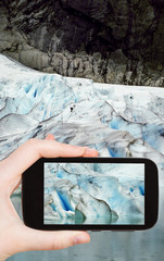 Poster - taking photo of snow briksdal glacier in Norway