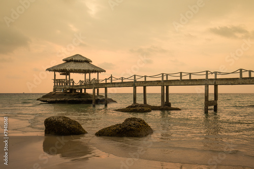 Obraz w ramie Bridge on beach in sunset and sea wave in Koh Kood , Thailand