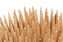 Extreme Closeup Of Stack Of Wooden Toothpicks Or Cocktail Sticks