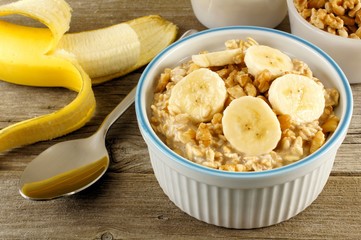 banana walnut overnight oatmeal in a bowl on wood table