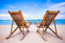 Beach Chairs On Perfect Tropical White Sand Beach