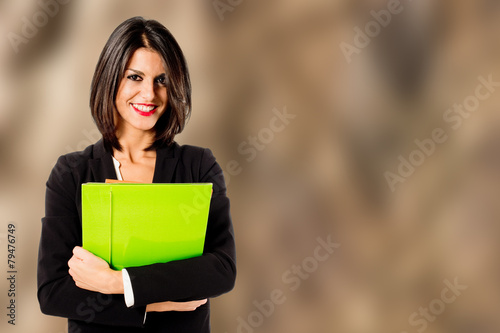 Fotografie, Obraz smiling professional woman on brown background