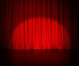 Fototapeta Morze - theatre red curtain or drapes background with light spot
