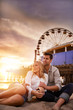 © Joshua Resnick - romantic couple relaxing on beach at santa monica