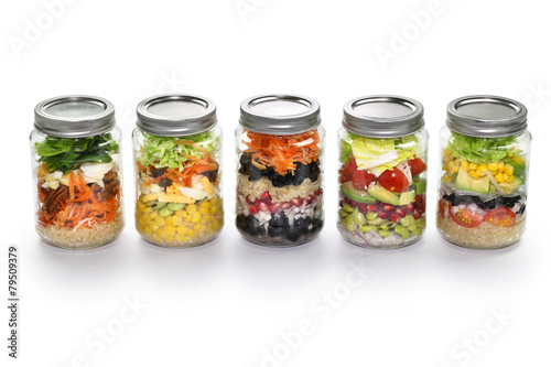 Fényképezés vegetable salad in glass jar, white background