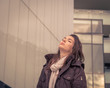 © tinx - Young beautiful girl posing in the city streets