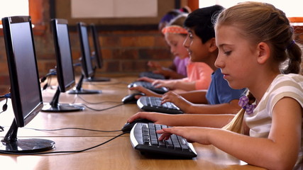 Pupils in computer class at school