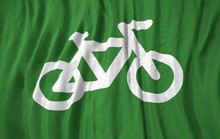 Bicycle Symbol Corrugated Realistic Green Flag 3d Illustration