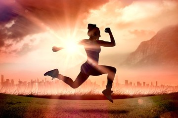 Aufkleber - Composite image of fit brunette running and jumping